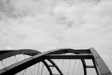 The steel construction of red bridge. Black and white
