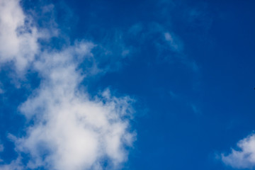 Fantastic soft white clouds against blue sky