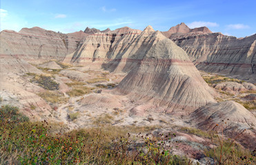 Badlands landscape, formed by deposition and erosion by wind and water, contains some of the richest fossil beds in the world, Badlands National Park, South Dakota, USA
