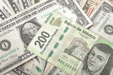 Dollar and Mexican Peso Bills