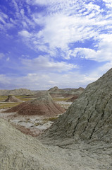 Badlands landscape, formed by deposition and erosion by wind and water, contains some of the richest fossil beds in the world, Badlands National Park, South Dakota, USA
