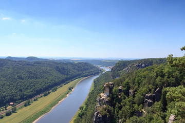 Fototapeta na wymiar Panorama view to river Elbe from rocks Bastei in Rathen, Saxon Switzerland