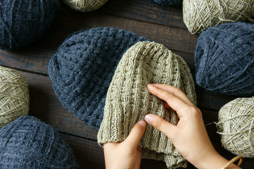 Fototapeta na wymiar Handmade, gift, couple, woollen hat, knitting