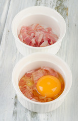 Baked eggs with bacon.