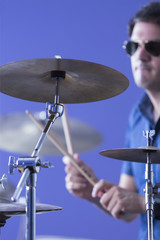 musician playing cymbals