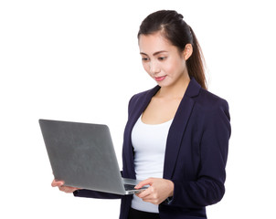 Asian businesswoman use of the laptop computer
