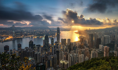 Hong Kong skyline at night and day