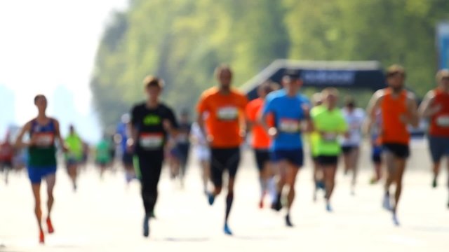 Blurred mass of marathon people running 