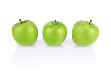 Three green apples isolated on white