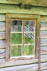 Window in old wooden rural house