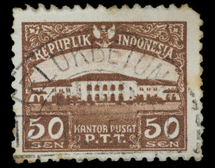 Postage stamp printed in Indonesia shows the P.T.T. Headquarters