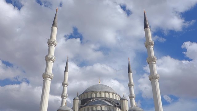 The Azan, a call to the prayer, in Kocatepe Mosque in Ankara Turkey