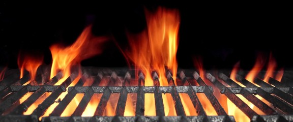 Hot Flaming BBQ Grill With Bright Flames And Glowing Coals