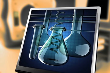 Laboratory glassware on blue background at monitor