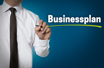 Business Plan is written by businessman background concept