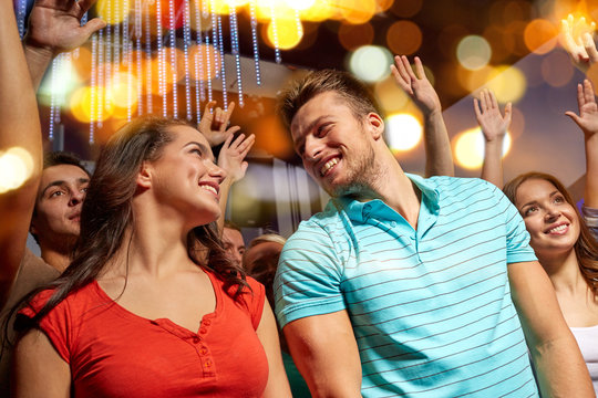 Happy Couple Having Fun At Music Concert In Club