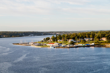 Fototapeta na wymiar Marina and Homes on Shore of Sydney Nova Scotia