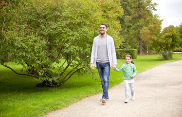 Fototapeta premium happy family walking in summer park