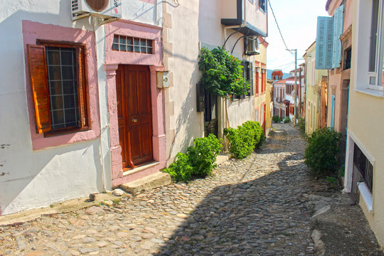A narrow street of old touristic town, Cunda Alibey Island, Ayvalik. It is a small island in the northwestern Aegean Sea, off the coast of Ayvalik in Balikesir Turkey.