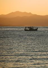Obraz premium Boat at sunrise