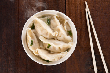 Top view Asian meal dumplings soup