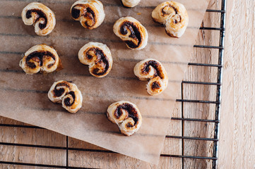 Puff pastry heart cookies on a baking paper