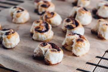 Puff pastry heart cookies on a baking paper