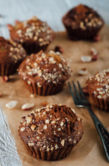 Homemade banana peanut muffins on baking paper