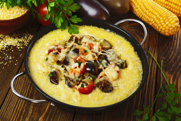 Polenta baked with vegetables and cheese