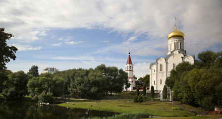 Fototapeta na wymiar General view of Russian Church building and nature in Minsk