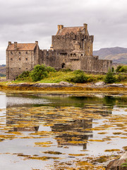Naklejka na ściany i meble Kyle of Lochalsh, Scotland, UK. September 19th 2015. Eilean Donan Castle at Low Tide
