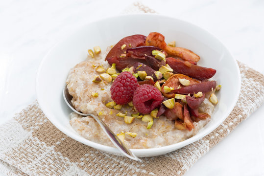 oatmeal with baked fruit, closeup