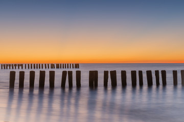 Long exposure breakwater photo. Baltic sea shore.
