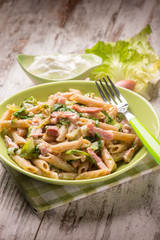 pasta with bacon lettuce and cream sauce, selective focus