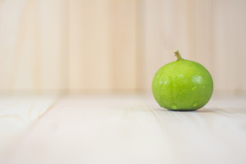 lemon on wooden table.
