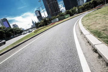 empty asphalt road in modern city