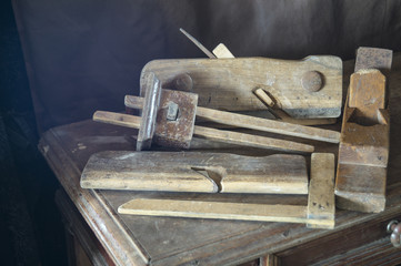 Old joiner's instruments to rest upon wooden table