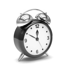 Black alarm clock on white