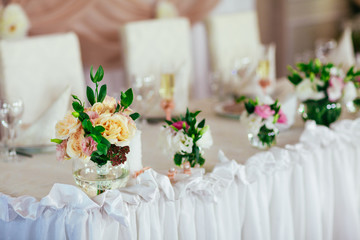 Wedding table decorations in restaurant.