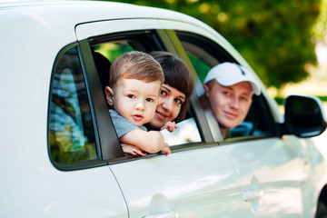 Happy family at the new car. Automobile.