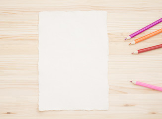 Colored pencils and drawing paper