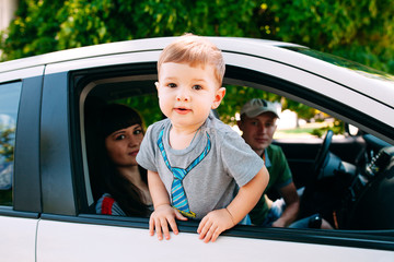 Happy family at the new car. Automobile.