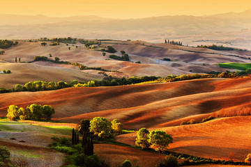 Tuscany countryside landscape at sunrise, Italy