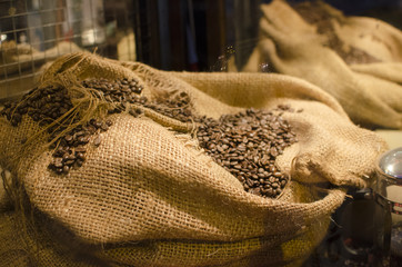 Fair trade coffee beans in woven bag