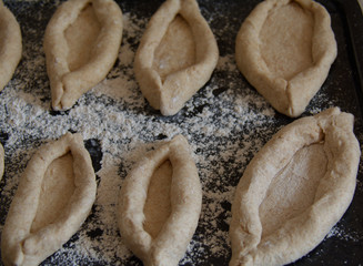 Formed dough for khachapuri ready to be filled