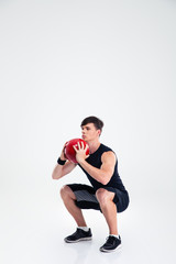 Sports man workout with fitness ball