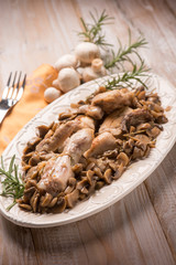 chicken with sauteed mushrooms, selective focus