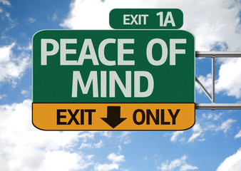 Peace of Mind road sign with sky background