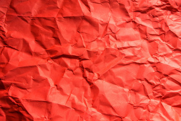 Fototapeta premium Crumpled red paper background