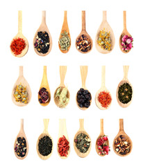 Collection of tea and natural additives in wooden spoons, isolated on white